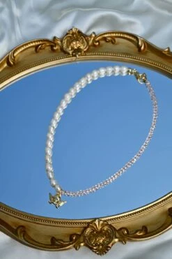 Dippin Daisys Shop -Dippin Daisys Shop DDBJCN PNK gold cherub necklace pink 1