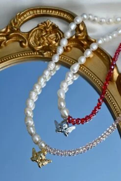 Dreamsbaby Jewels X Dippin Daisys Gold Cherub Necklace -Dippin Daisys Shop DDBJCN PNK gold cherub necklace pink 2